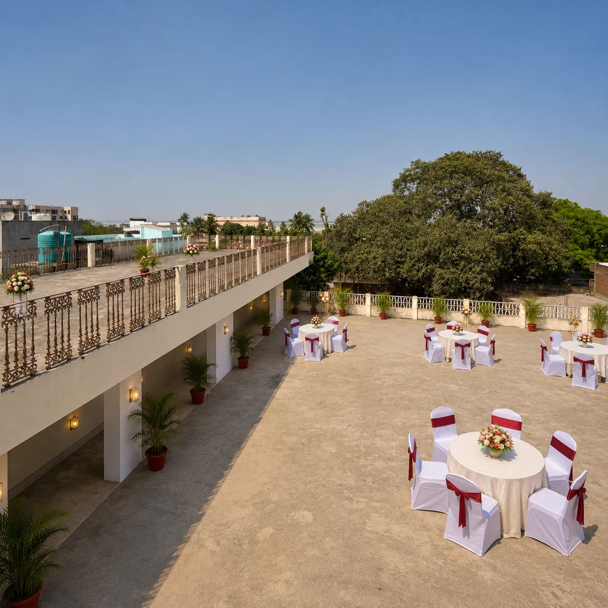 Daytime rooftop arranged with guest tables